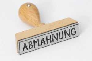 Stempel mit Aufschrift Abmahnung