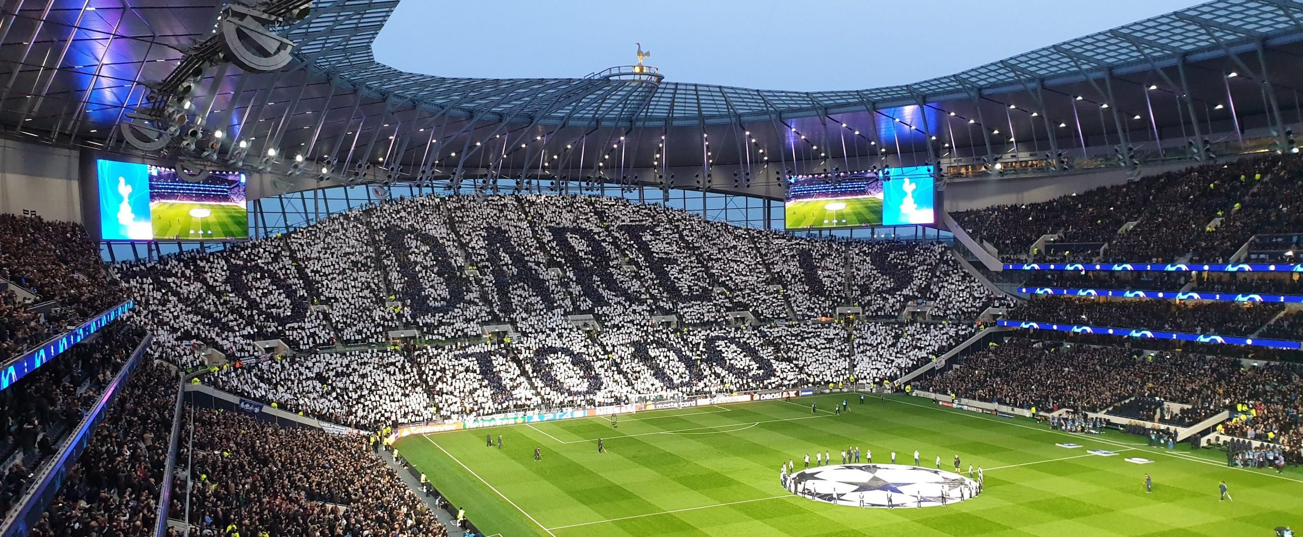 Tottenham Hotspur Stadium South Stand|1xBet Logo